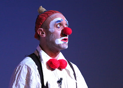 person wearing red Pierrot nose thumbnail