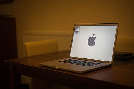 opened MacBook on table thumbnail