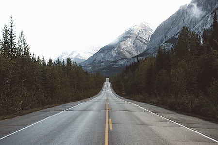 empty road near mountains thumbnail
