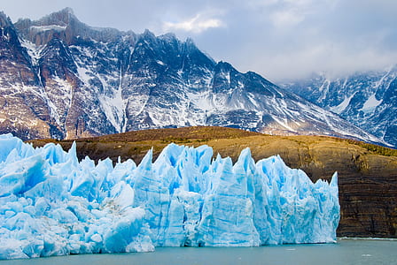 ice berg in a distance of mountain thumbnail