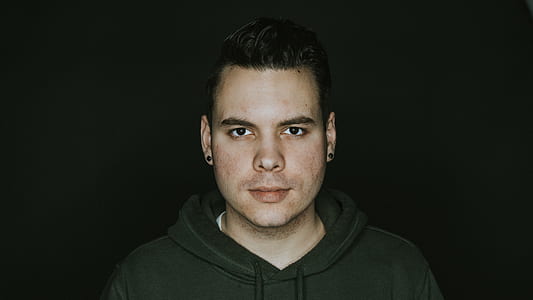 man wearing black pullover hoodie thumbnail