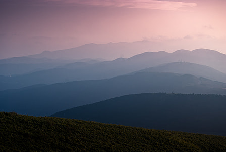 silhouette of mountain during golden hour thumbnail