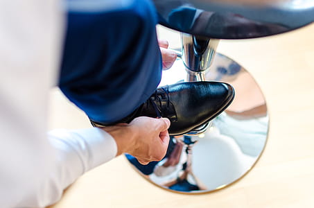 person tying shoes thumbnail