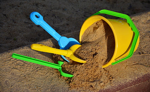 sand bucket and three assorted-color sand shovels thumbnail