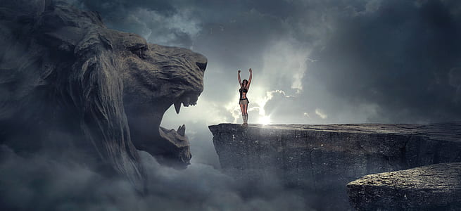 person standing in front of lion statue thumbnail