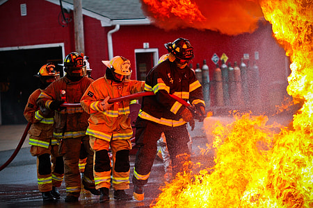 four firefighters fighting fire thumbnail