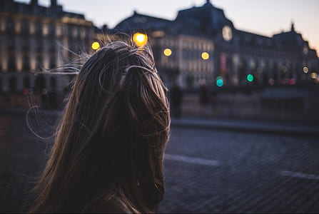 woman standing near building thumbnail
