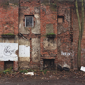 brown and white concrete abandon house thumbnail