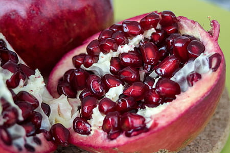 sliced red fruits with seeds thumbnail