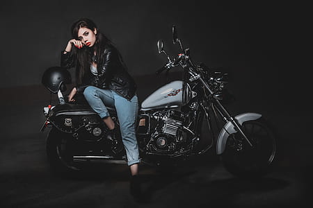 woman sitting on cruiser motorcycle thumbnail