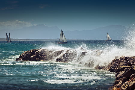 sailboat on sea during daytime thumbnail