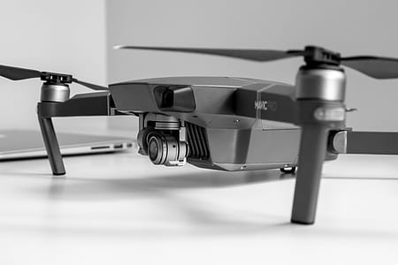 New drone with camera for filming on the table at office thumbnail