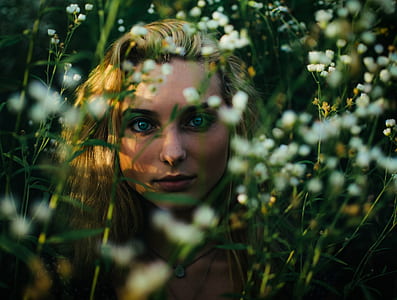 selective photography of woman face thumbnail