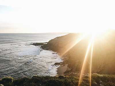 sunrays over coastline thumbnail