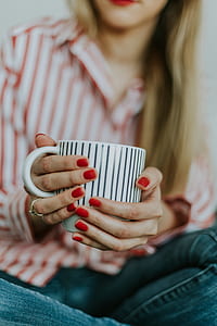 woman holding coffee mug thumbnail