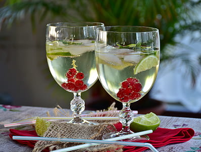 two filled clear wineglasses thumbnail
