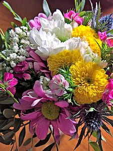 yellow chrysanthemum flowers, pink daisy, baby's breath flowers, blue sea holly flowers, and pink carnation flowers bouquet thumbnail