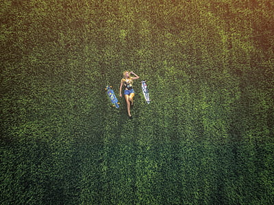 woman lying on grass thumbnail