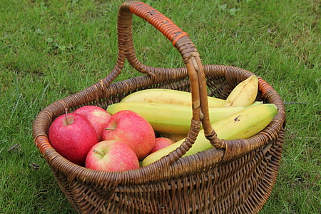 yellow bananas and red apples in brown wicker basket thumbnail
