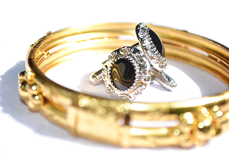 selective focus photo of earrings and bracelet thumbnail