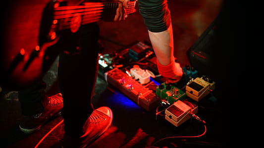 person holding electric guitar thumbnail