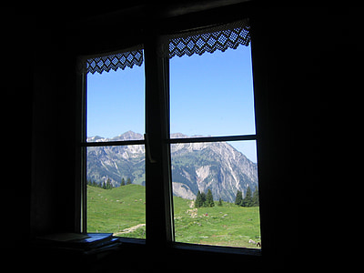 window overlooking the mountains at daytie thumbnail