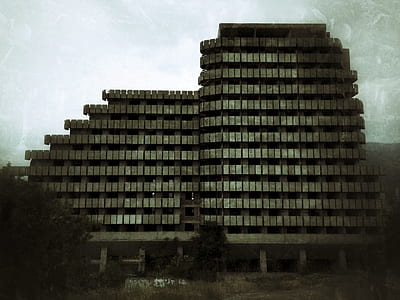 photo of gray and brown building thumbnail
