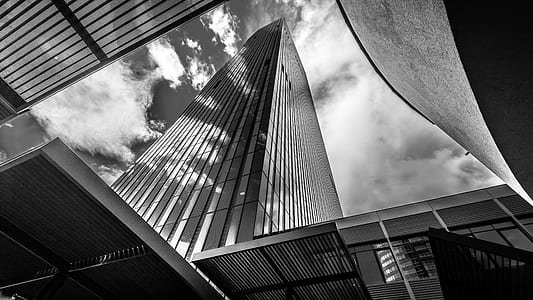 grayscale photography of high rise building thumbnail