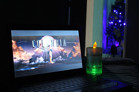turned-on black laptop computer thumbnail