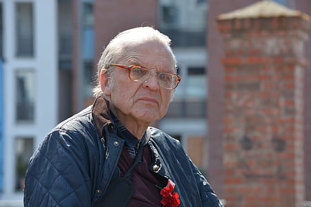 portrait photography of man wearing quilted jacket thumbnail