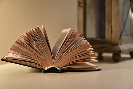 time lapse photography of opened book thumbnail