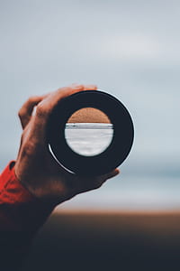 person holding black scope thumbnail