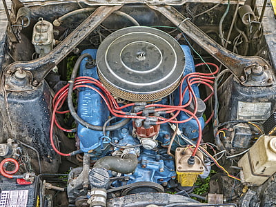 closeup photo of gray vehicle engine bay thumbnail