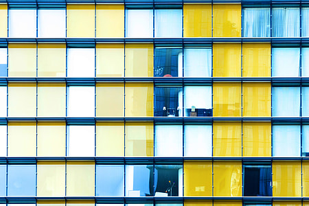 Colourful buildings with grid-based design and windows thumbnail
