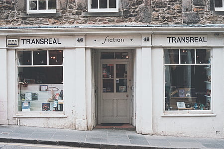 photo of white Transreal Fiction store at daytime thumbnail