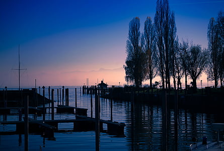 dock near body of water at night thumbnail