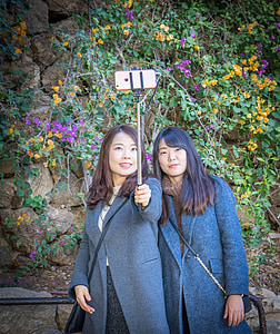 two women taking selfie thumbnail