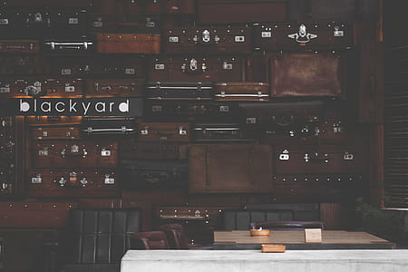 pile of suitcases with blackyard text overlay thumbnail