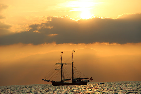 selective photo of sailboat during golden hour thumbnail