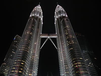 Petronas Tower in low angle shot during nighttime thumbnail