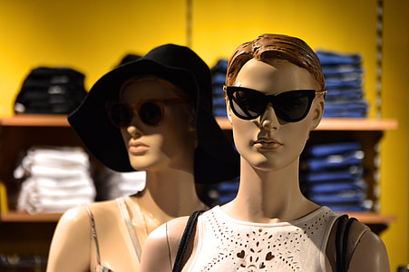 female mannequin with black framed sunglasses on thumbnail