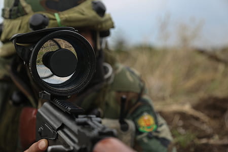 soldier using sniper scope on assault rifle thumbnail