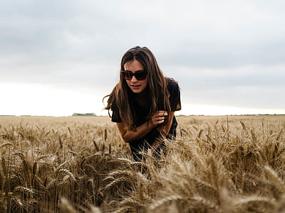 woman standing on wheat field thumbnail