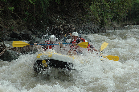group of people water rafting on waves thumbnail