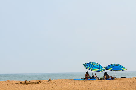 person sitting in front of beach thumbnail
