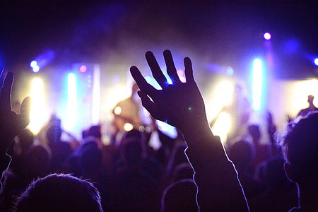 group of people on concert stage thumbnail