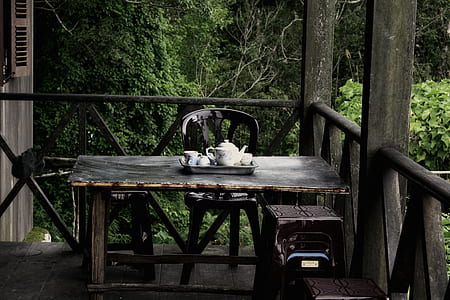 white ceramic teapot set on table thumbnail