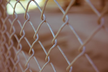 close-up photography of gray metal fence thumbnail