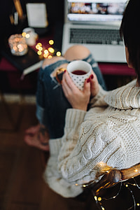 Woman drinking hot tea in her home office thumbnail