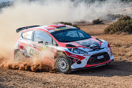 rally car drifting on mud thumbnail